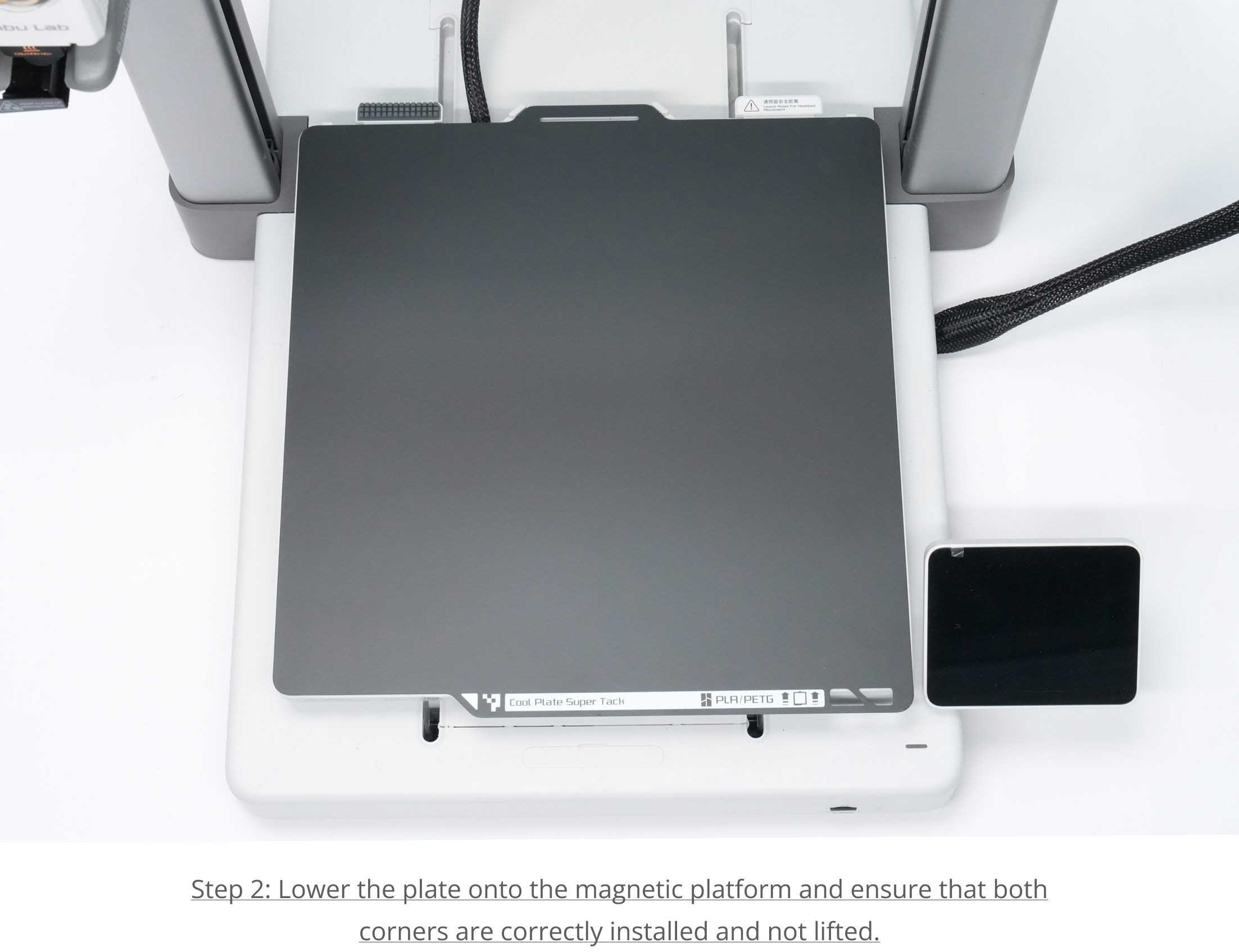 Step 2: Lower the plate and secure to the magnetic platform
